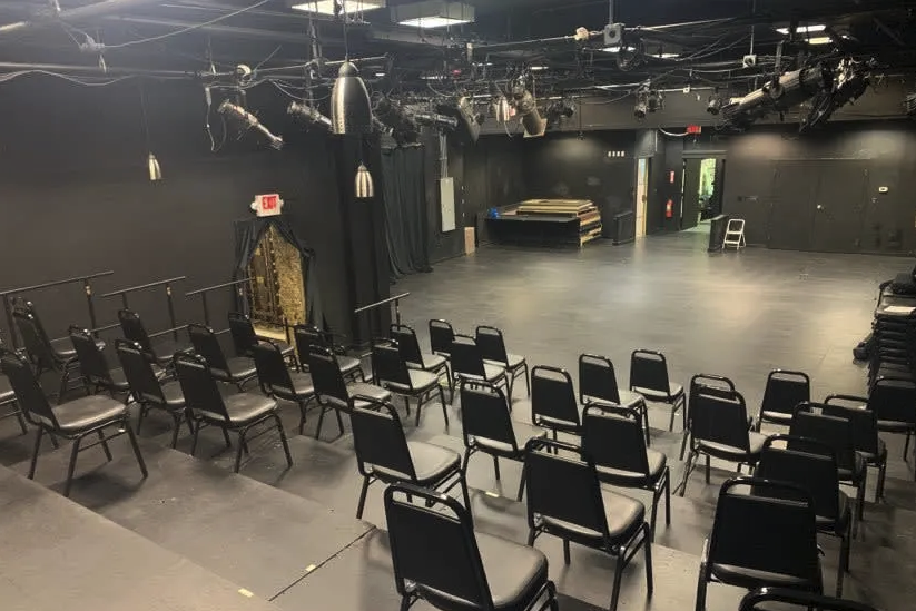 a large room with a bunch of chairs in it.