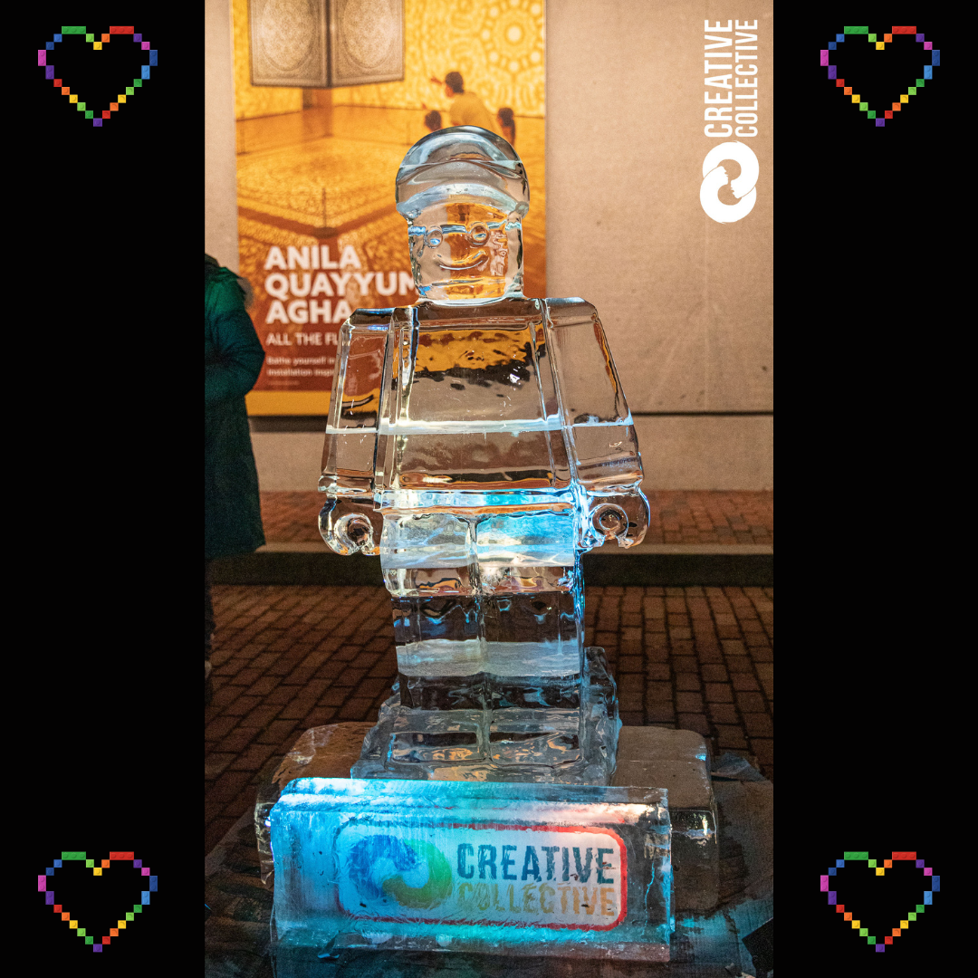 An enchanting ice sculpture illuminated by the soft glow of night. Delicate ice crystals glimmer in the darkness, creating a stunning and ethereal display of frozen art.