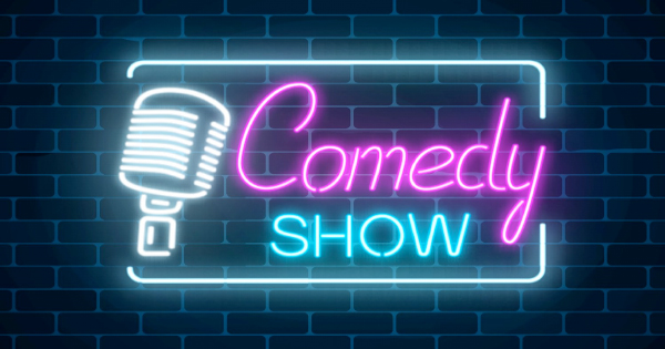 a neon sign that says comedy show.