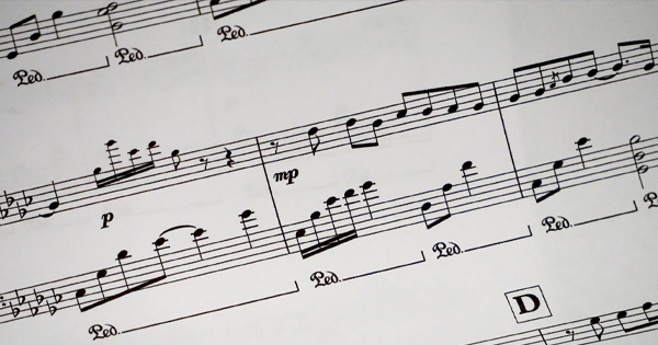 a sheet of music with musical notes on it.