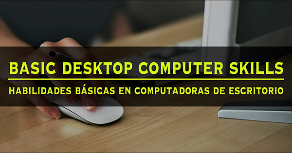 Image description: A hand on a mouse beside a computer monitor, featuring text that reads "Basic Desktop Computer Skills" and its Spanish counterpart, "Habilidades Básicas en Computadoras de Escritorio".