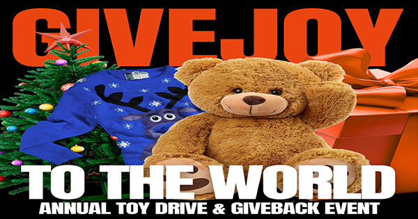 A joyful teddy bear, festive tree, and bright gift box ignite Essex County spirit at the lively “GIVE JOY TO THE WORLD” toy drive.