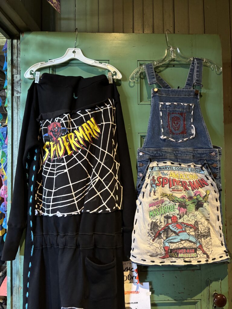 Custom vintage upcycled Marvel Spider-Man overalls and hoodie by designer Marco Collins on display at Lynn Vintage Warehouse